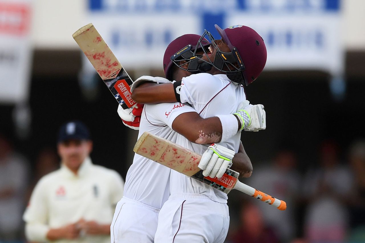 Kraigg Brathwaite and John Campbell celebrate the winning moment, West Indies v England, 2nd Test, 3rd day, Antigua, February 2, 2019