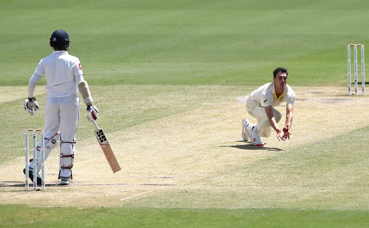 Pat Cummins made a lot of ground to claim a caught and bowled, Australia v Sri Lanka, 2nd Test, Canberra, February 4, 2019