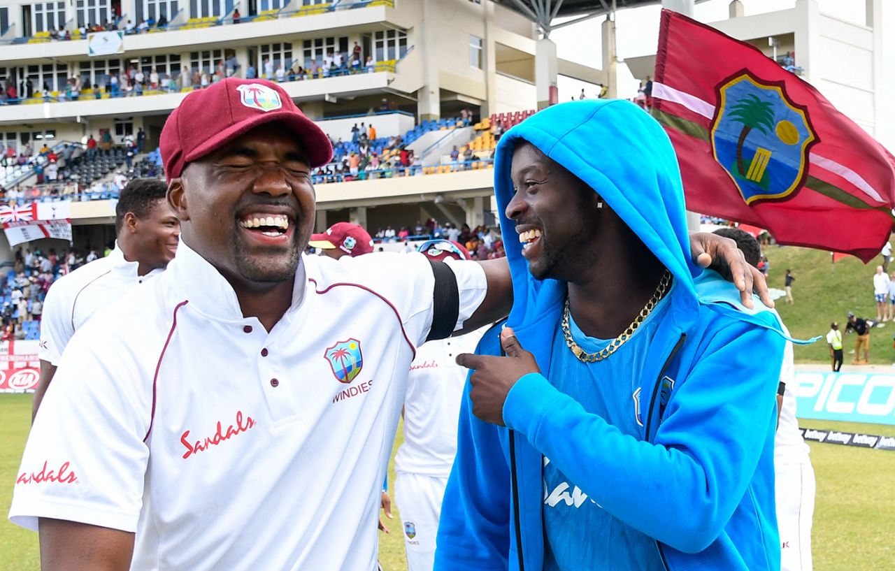 Darren Bravo and Kemar Roach celebrate West Indies' series win, West Indies v England, 2nd Test, 3rd day, Antigua, February 2, 2019