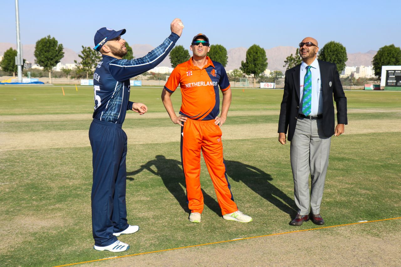 Kyle Coetzer spins the coin toss for Pieter Seelaar to call in the opening match of the Oman T20I Quad Series, Netherlands v Scotland, Oman Quadrangular T20I Series, Al Amerat, February 13, 2019