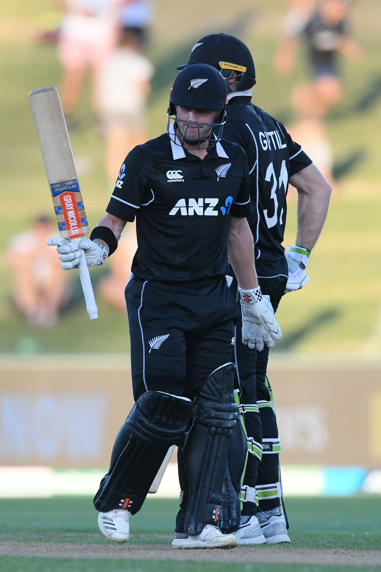 Henry Nicholls raises his bat after getting to fifty, New Zealand v Bangladesh, 1st ODI, Napier
