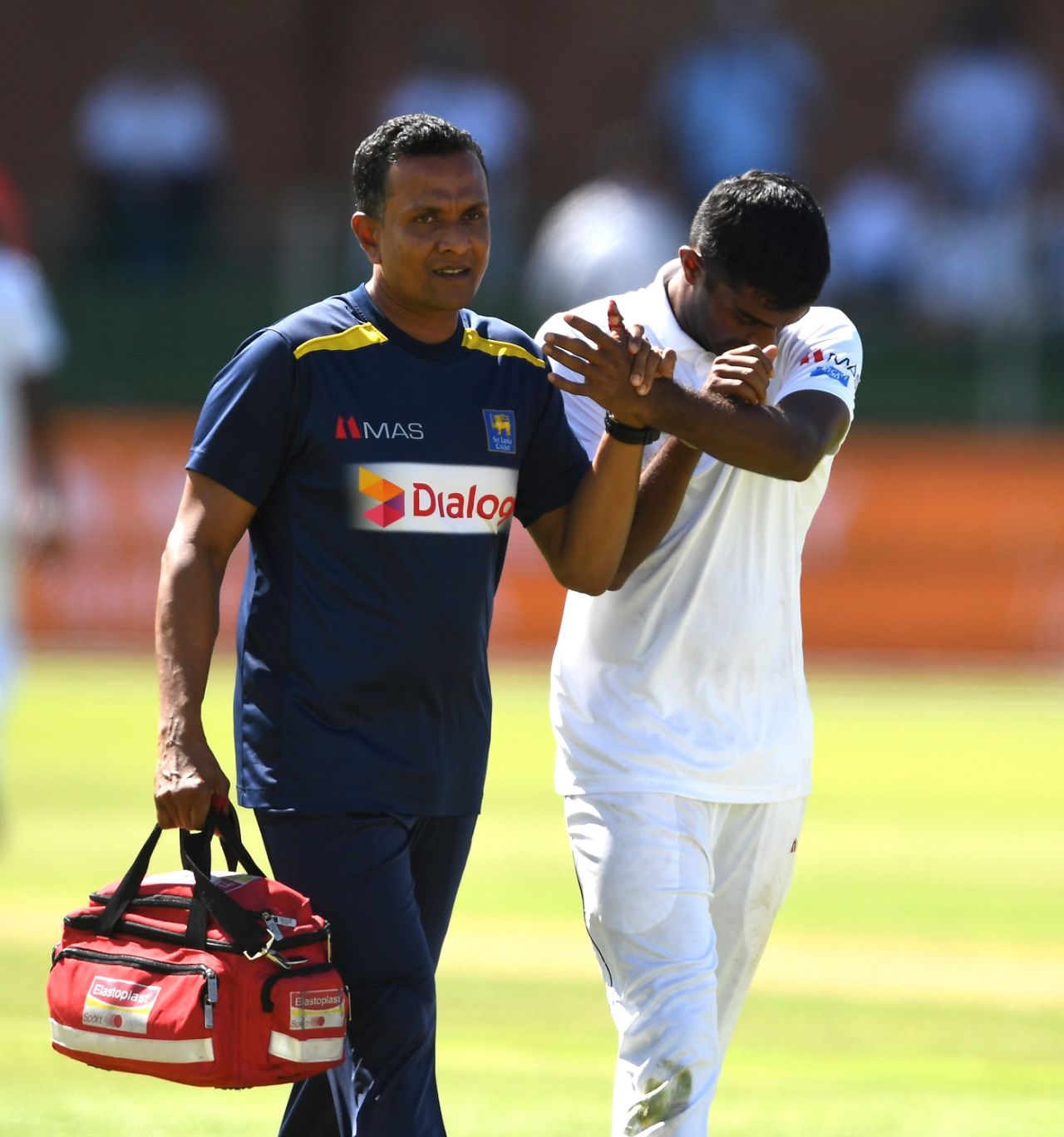 Lasith Embuldeniya is helped off the field after injuring his left thumb, South Africa v Sri Lanka, 2nd Test, Port Elizabeth, 1st day, February 21, 2019