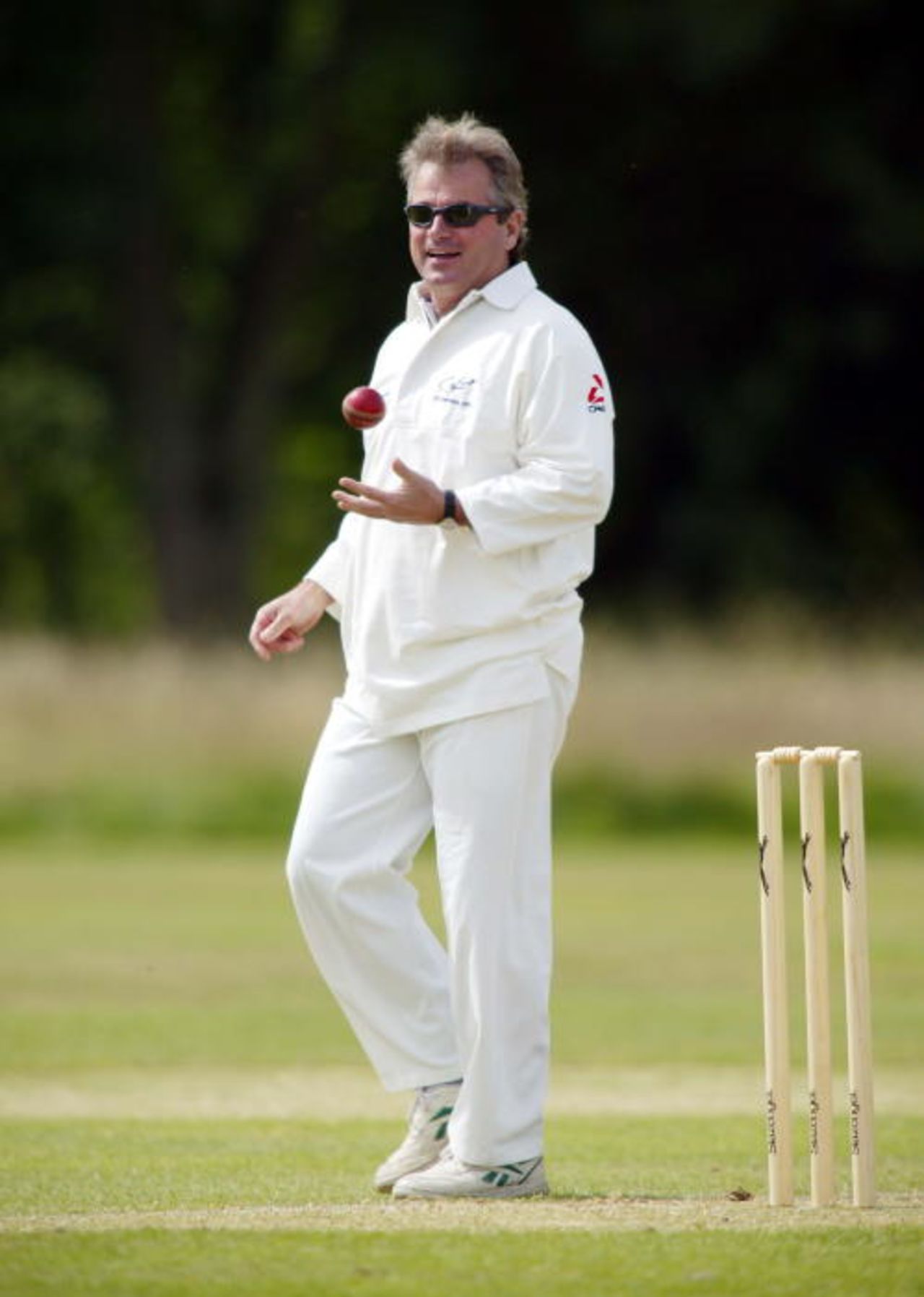 Allan Lamb bowling at the Carphone Warehouse Challenge, Robin Smith Testimonial - David Ross Estate, July 31, 2003