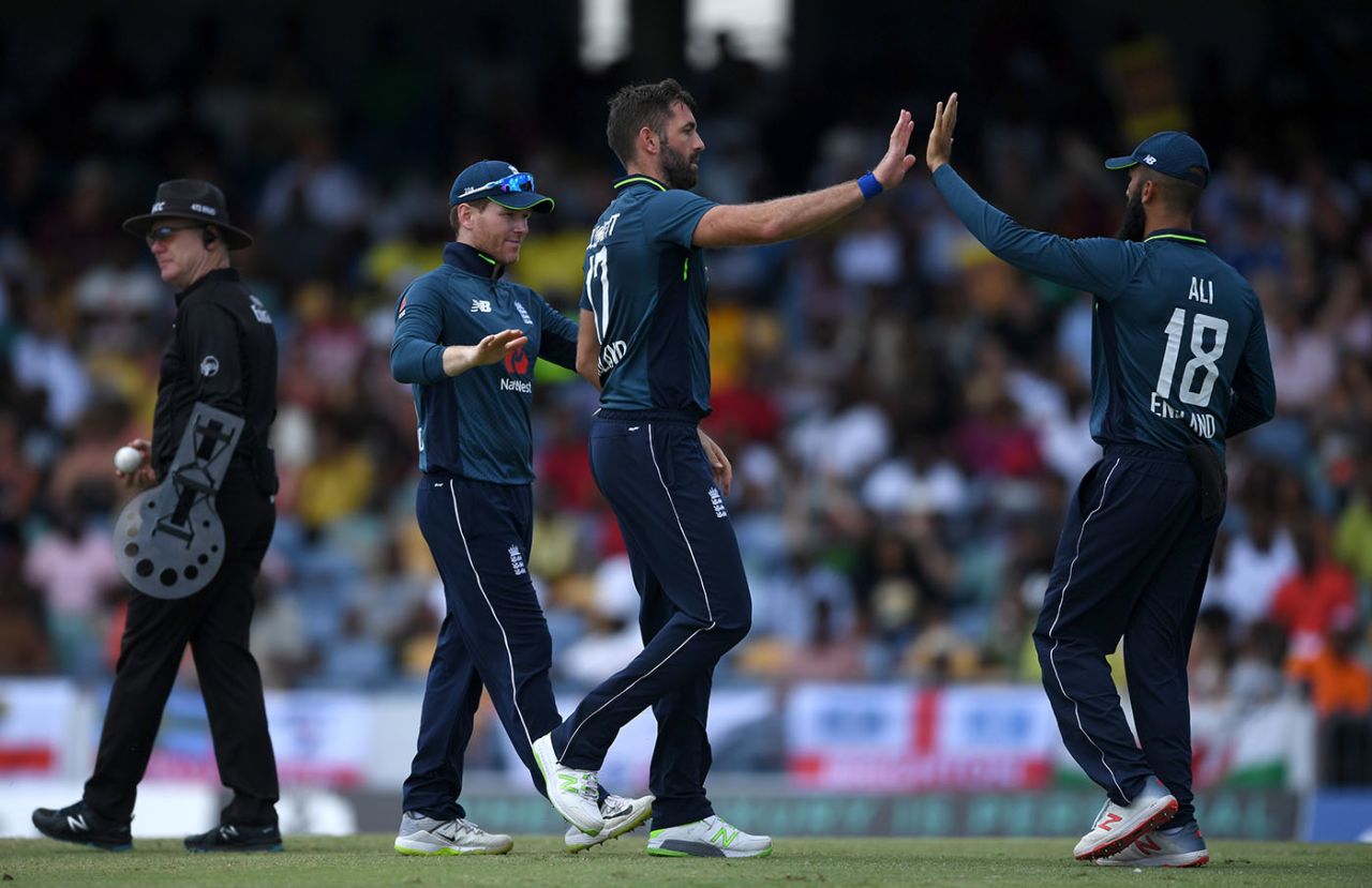 Liam Plunkett celebrates with Moeen Ali after dismissing John Campbell, West Indies v England, 2nd ODI, Barbados, February 22, 2019