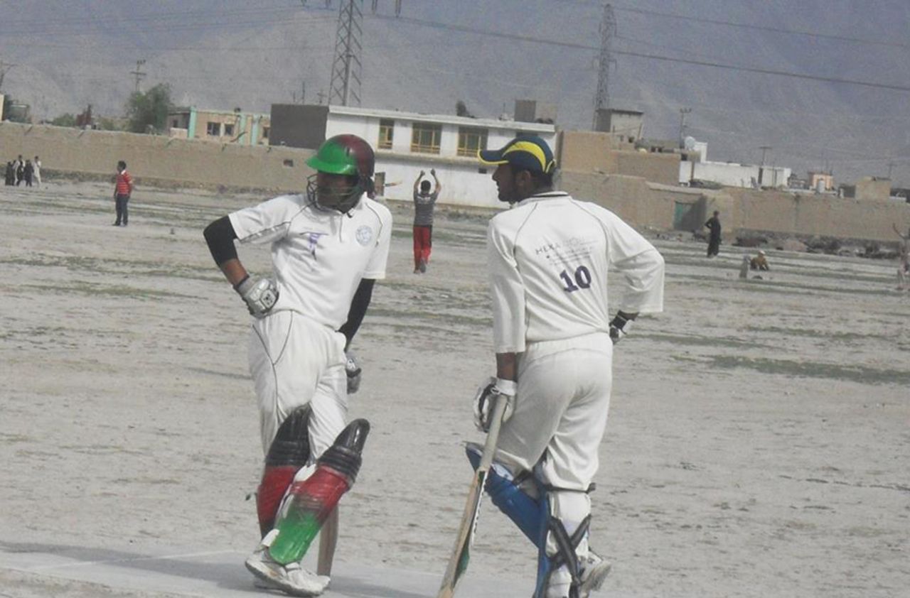 Zazai (left) painted his first pads and helmet in Afghanistan colours, 2013