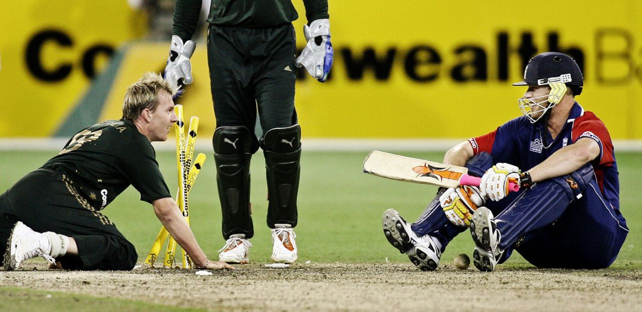 Brett Lee and Andrew Flintoff laugh after falling to the ground, Australia v England, first CB Series final, Melbourne, February 9, 2007