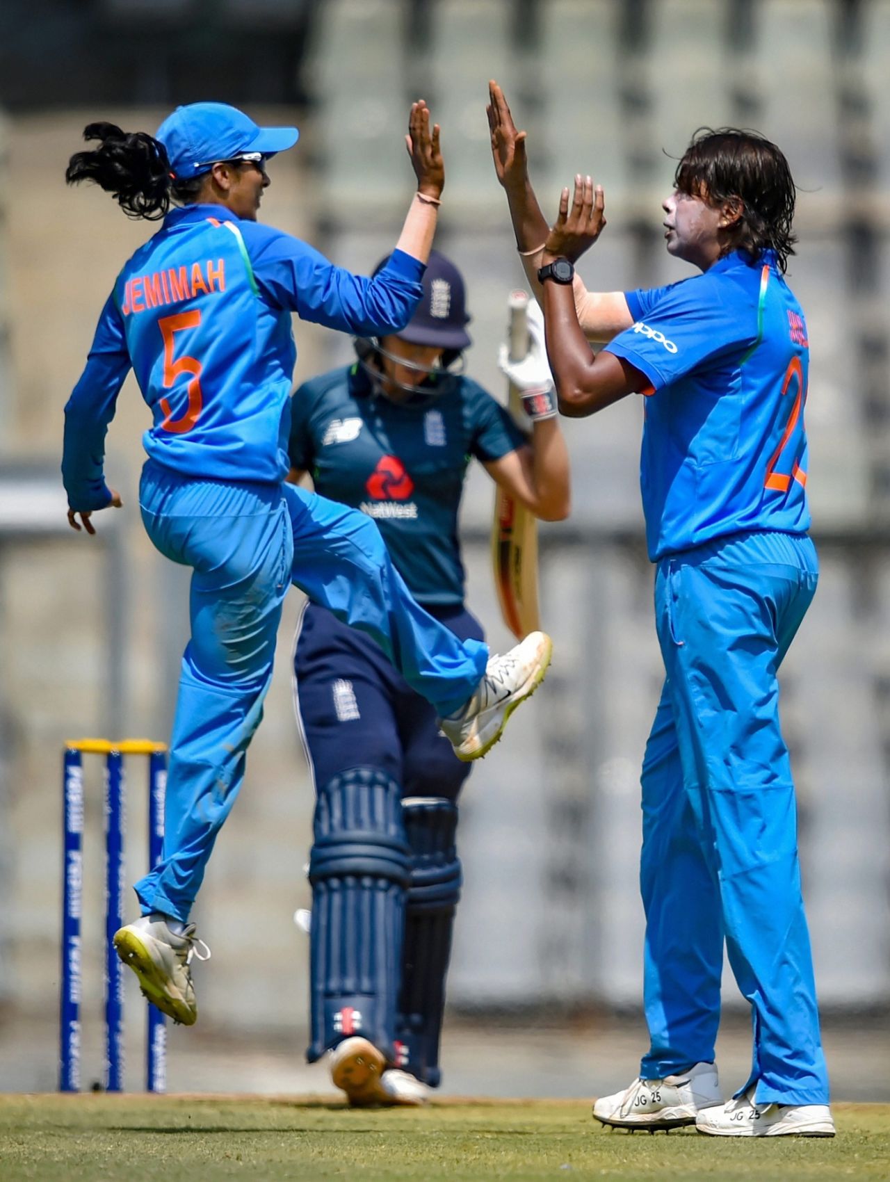 Jhulan Goswami and Jemimah Rodrigues celebrate a wicket, India v England, 3rd women's ODI, Mumbai, February 28, 2019