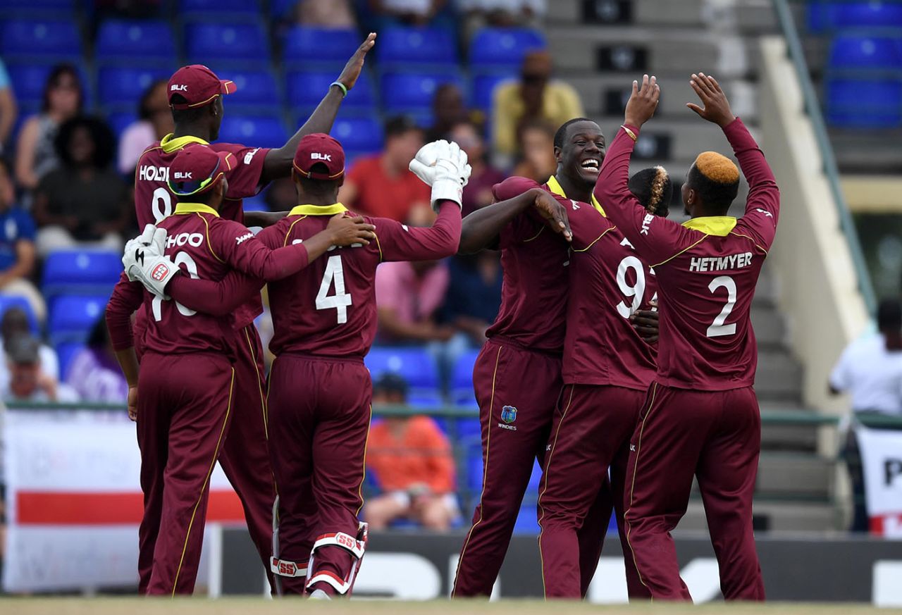 Carlos Brathwaite celebrates with his team-mates, West Indies v England, 2nd T20I, , St Kitts, March 8, 2019