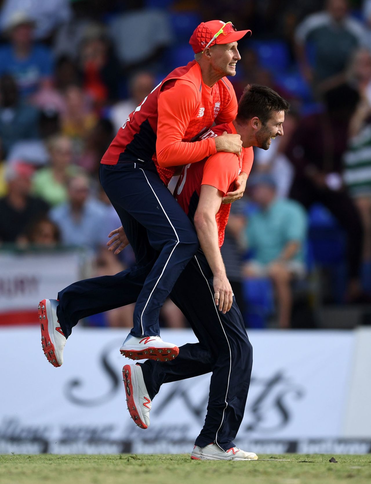 Mark Wood celebrates with Joe Root after dismissing Nicholas Pooran, West Indies v England, 3rd T20I, St Kitts, March 10, 2019