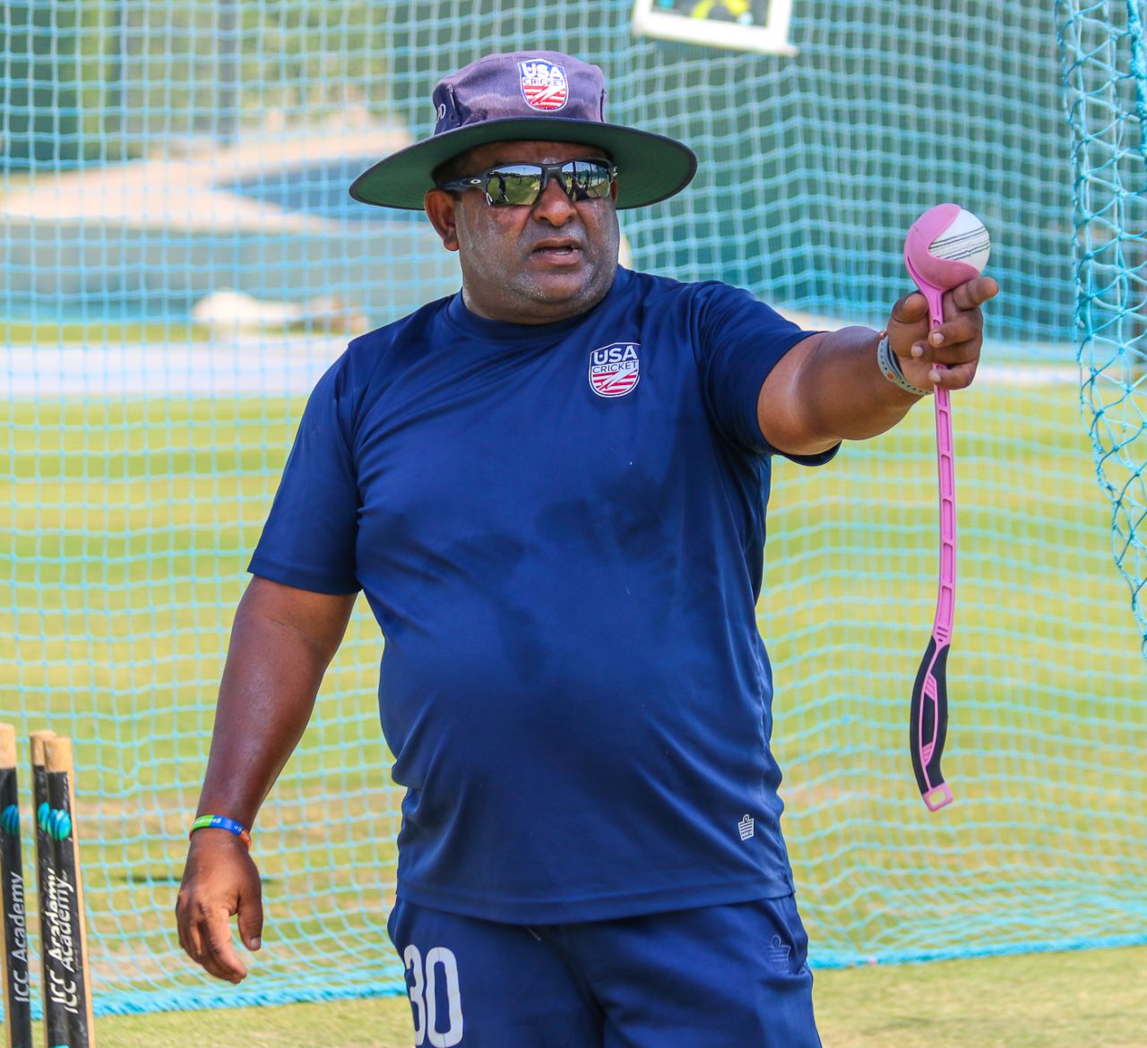 USA coach Pubudu Dassanayake gets things in motion during training, Dubai, March 14, 2019