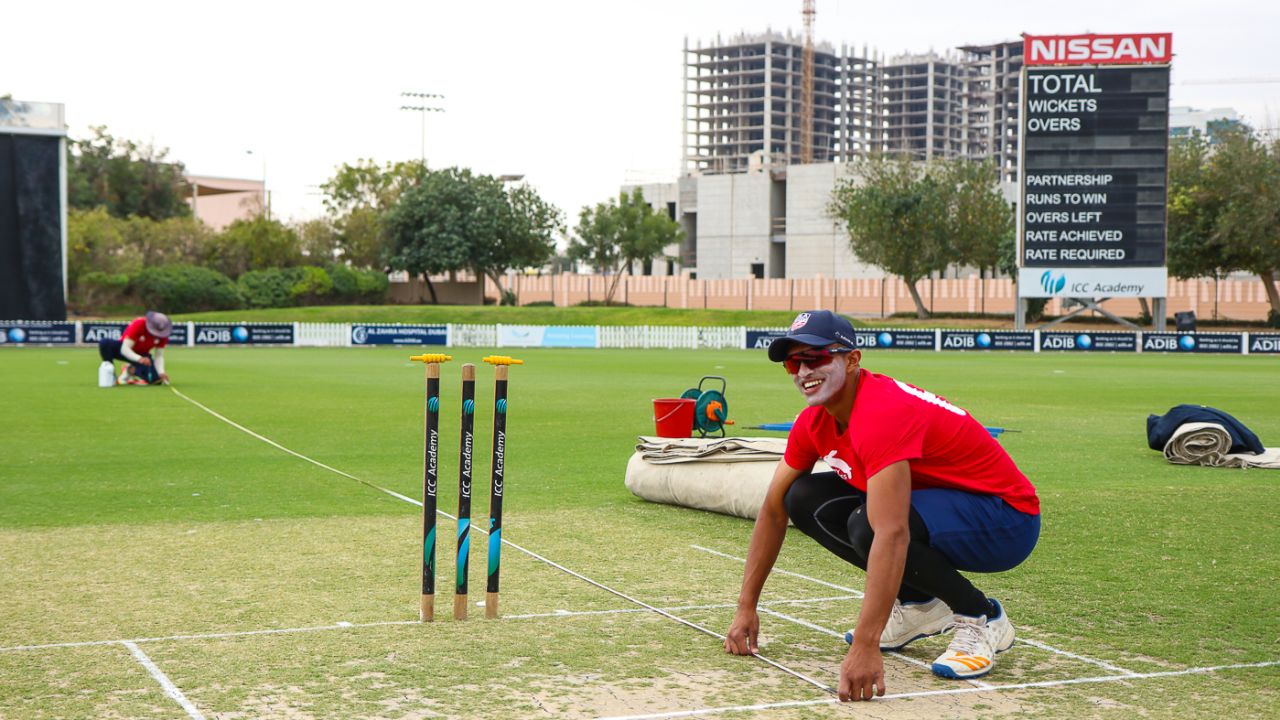 Nosthush Kenjige helps Jessy Singh mark out his runup before play, UAE v USA, 1st T20I, Dubai, March 15, 2019