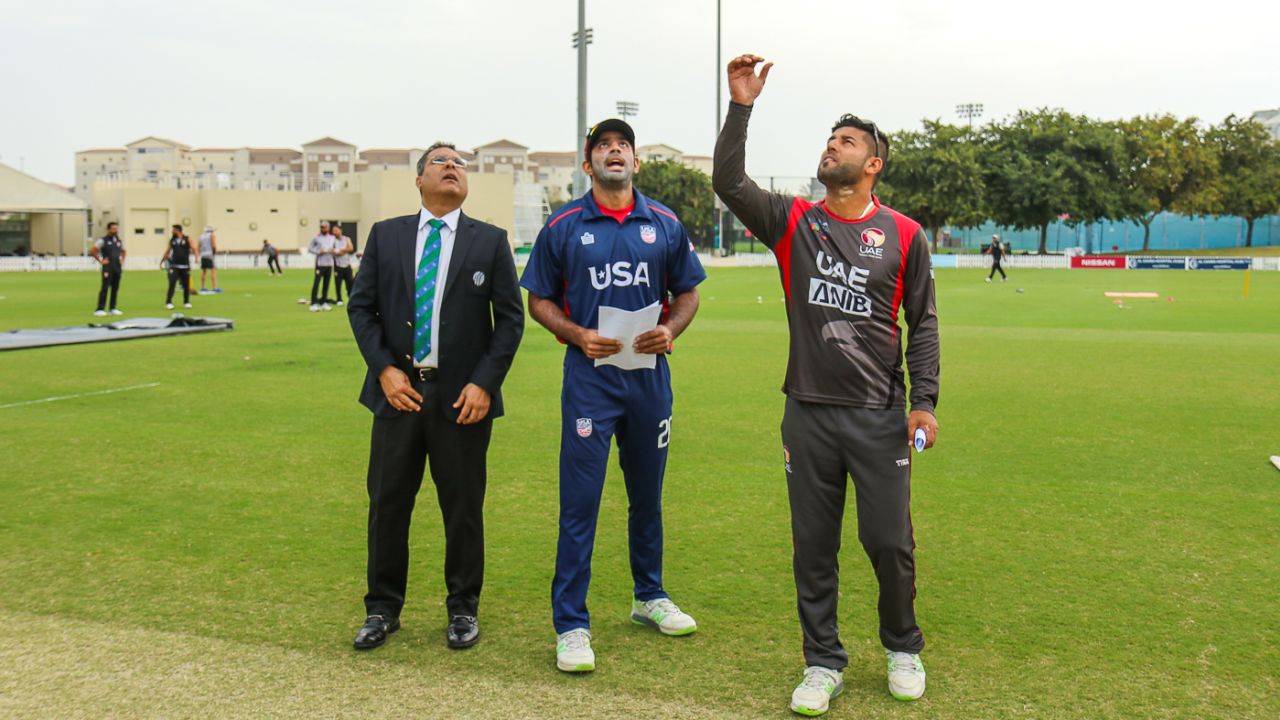 USA captain Saurabh Netravalkar calls heads as it lands tails at the toss for USA's maiden T20I, UAE v USA, 1st T20I, Dubai, March 15, 2019