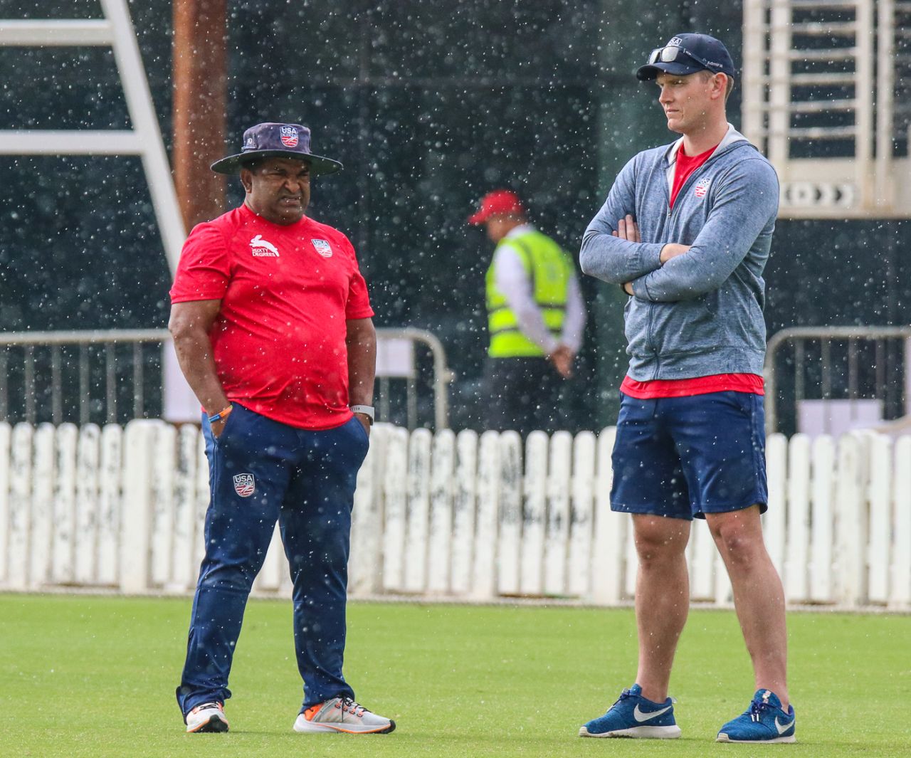 USA coach Pubudu Dassanayake stands frustrated in the rain as USA's maiden T20I ended with no result, UAE v USA, 1st T20I, Dubai, March 15, 2019