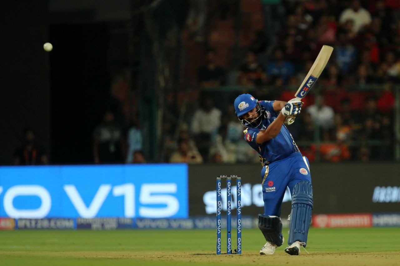 Rohit Sharma launches the ball over the off side, Royal Challengers Bangalore v Mumbai Indians, IPL 2019, Bengaluru, March 28, 2019