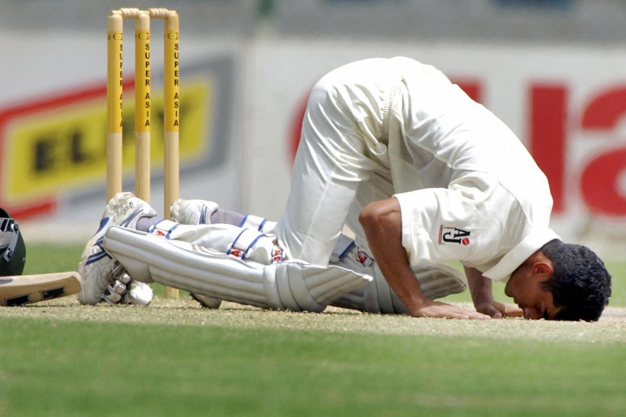 Yasir Hameed touches his forehead on the pitch after his double century, 1st Test, Pakistan v Bangladesh, Karachi, 24 August 2003