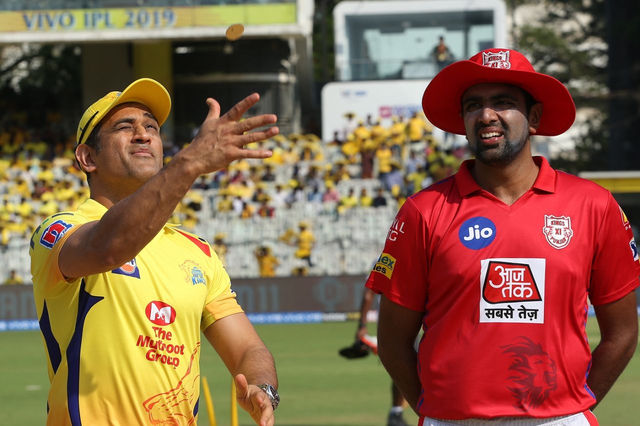 MS Dhoni flicks the coin as R Ashwin looks on, Chennai Super Kings v Kings XI Punjab, IPL 2019, Chennai, April 6, 2019