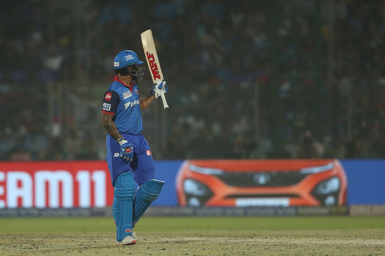 Shikhar Dhawan raises his bat on reaching a half-century, Delhi Capitals v Kings XI Punjab, IPL 2019, Delhi, April 20, 2019