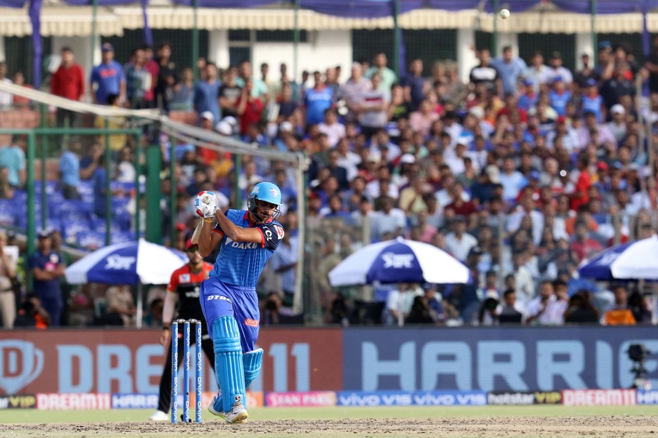 Axar Patel hits one down the ground, Delhi Capitals v Royal Challengers Bangalore, IPL 2019, Delhi, April 28, 2019