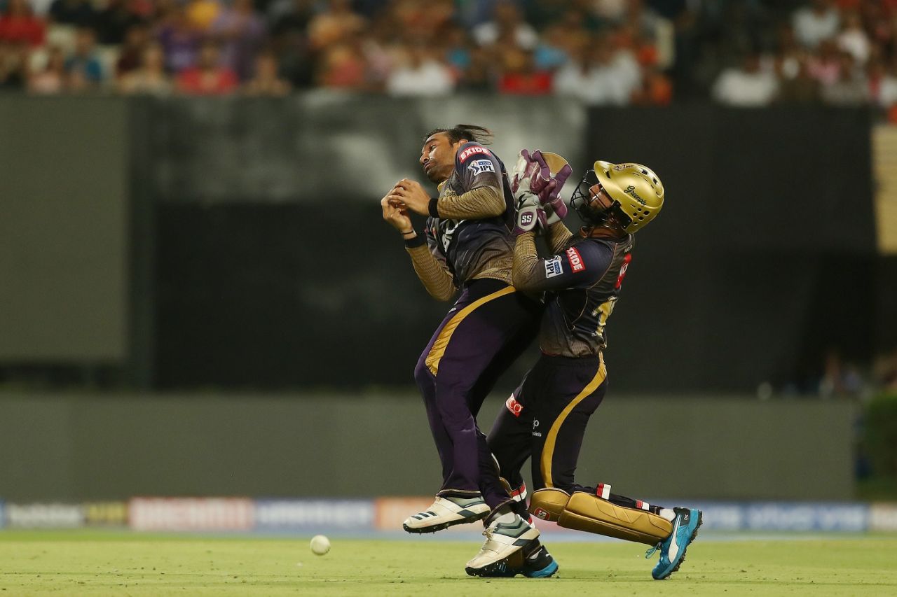 A catch goes down as Dinesh Karthik collides with Robin Uthappa, Kolkata Knight Riders v Mumbai Indians, IPL 2019, Kolkata, April 28, 2019