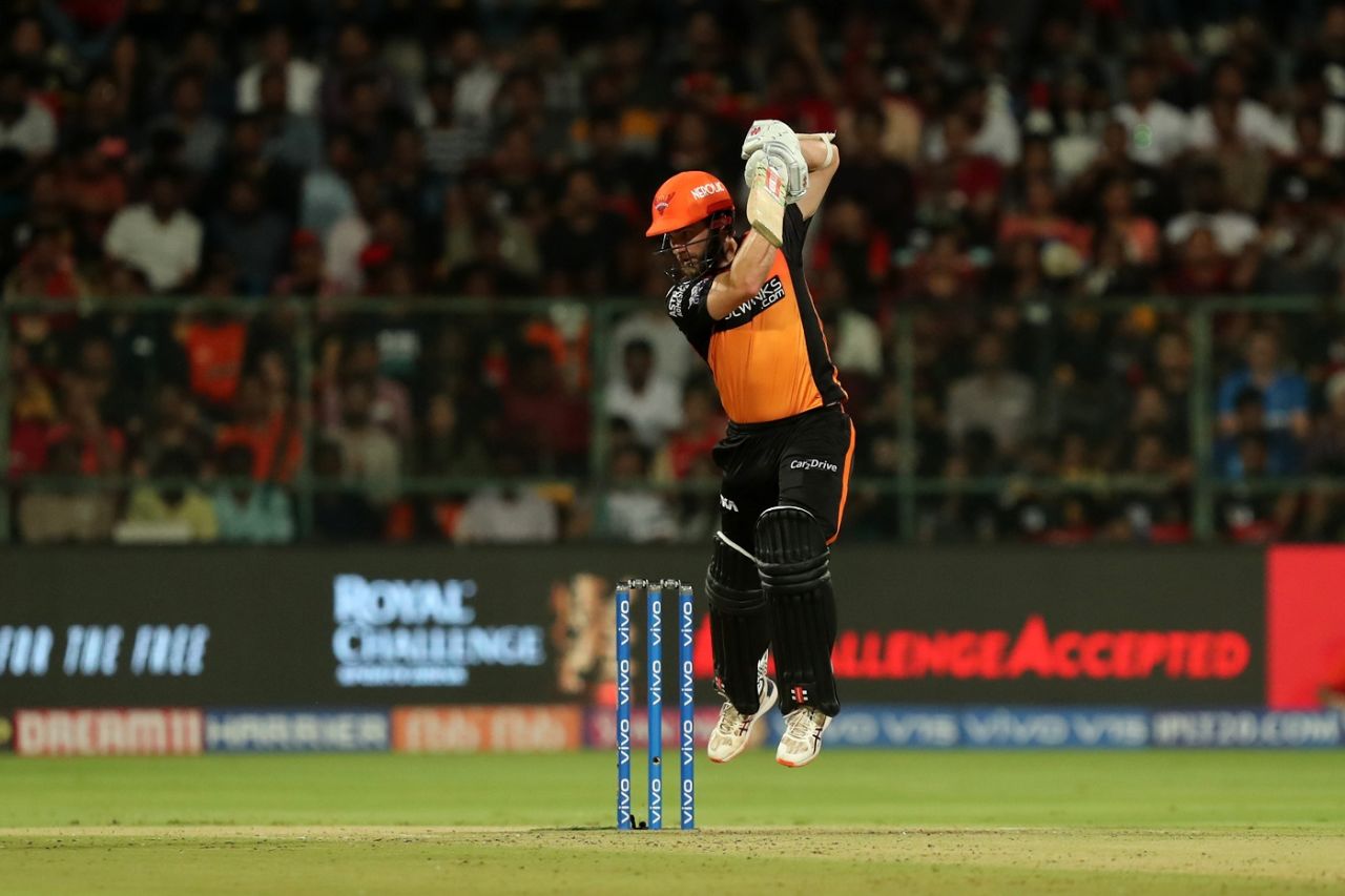 Kane Williamson is airborne as he punches one through the off side, Royal Challengers Bangalore v Sunrisers Hyderabad, IPL 2019, Bengaluru, May 4, 2019