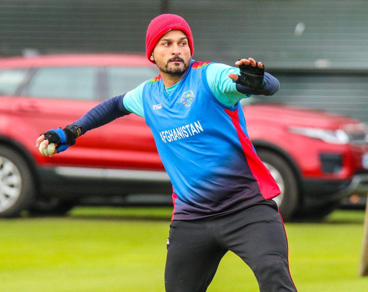 Hamid Hassan relays in a throw during an Afghanistan training session, Edinburgh, May 7, 2019