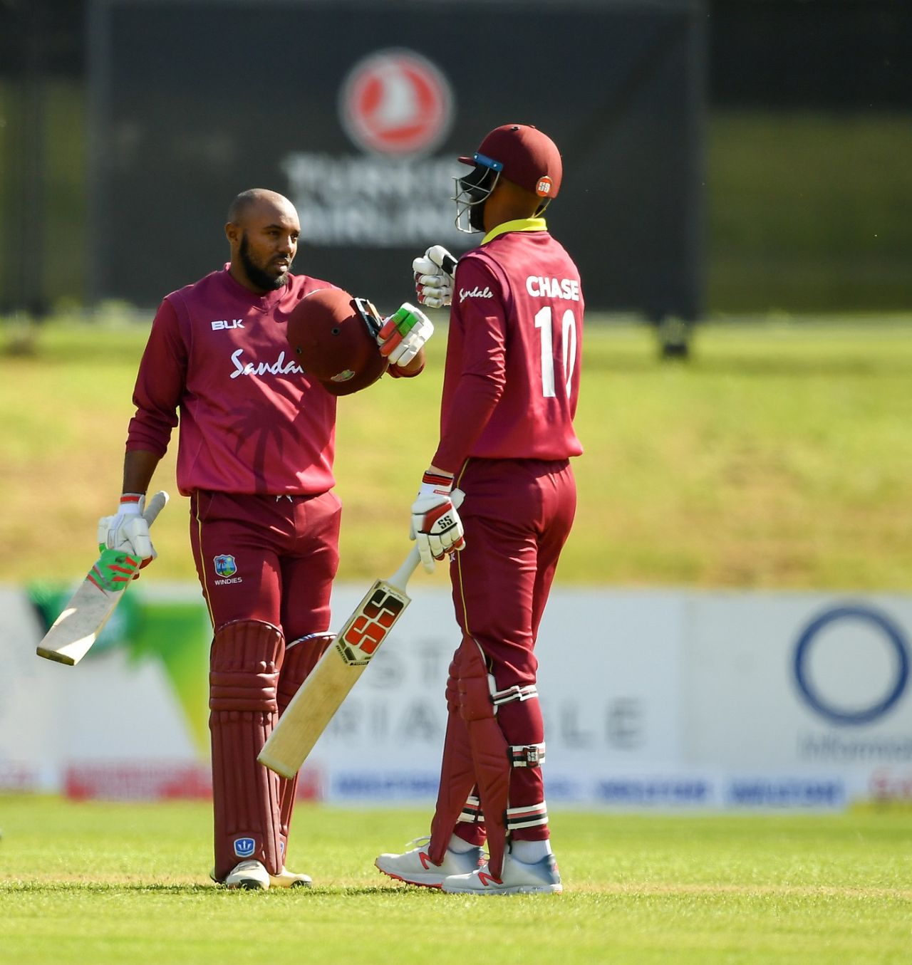 Sunil Ambris punches gloves with Roston Chase after his maiden ODI century, Ireland v West Indies, Match 4, Ireland tri-series, Dublin, May 11, 2019