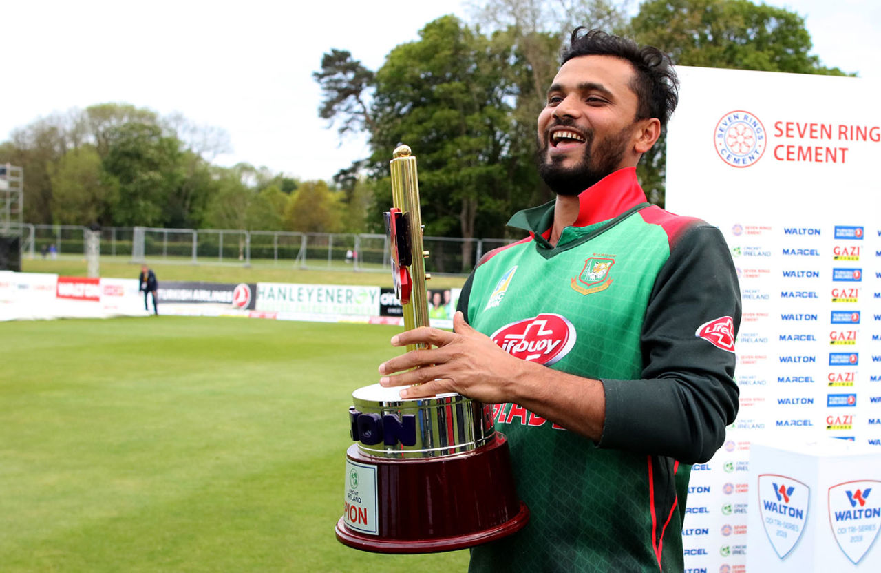 An elated Mashrafe Mortaza sports a grin with the tri-nation series trophy in hand, West Indies v Bangladesh, tri-nation series final, Malahide, May 17, 2019