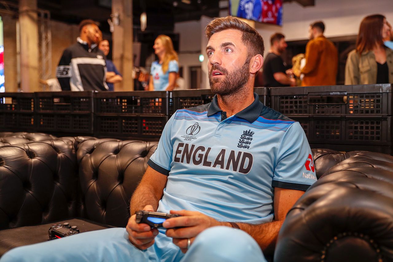 Liam Plunkett plays a video game at the England World Cup kit launch, May 21, 2019