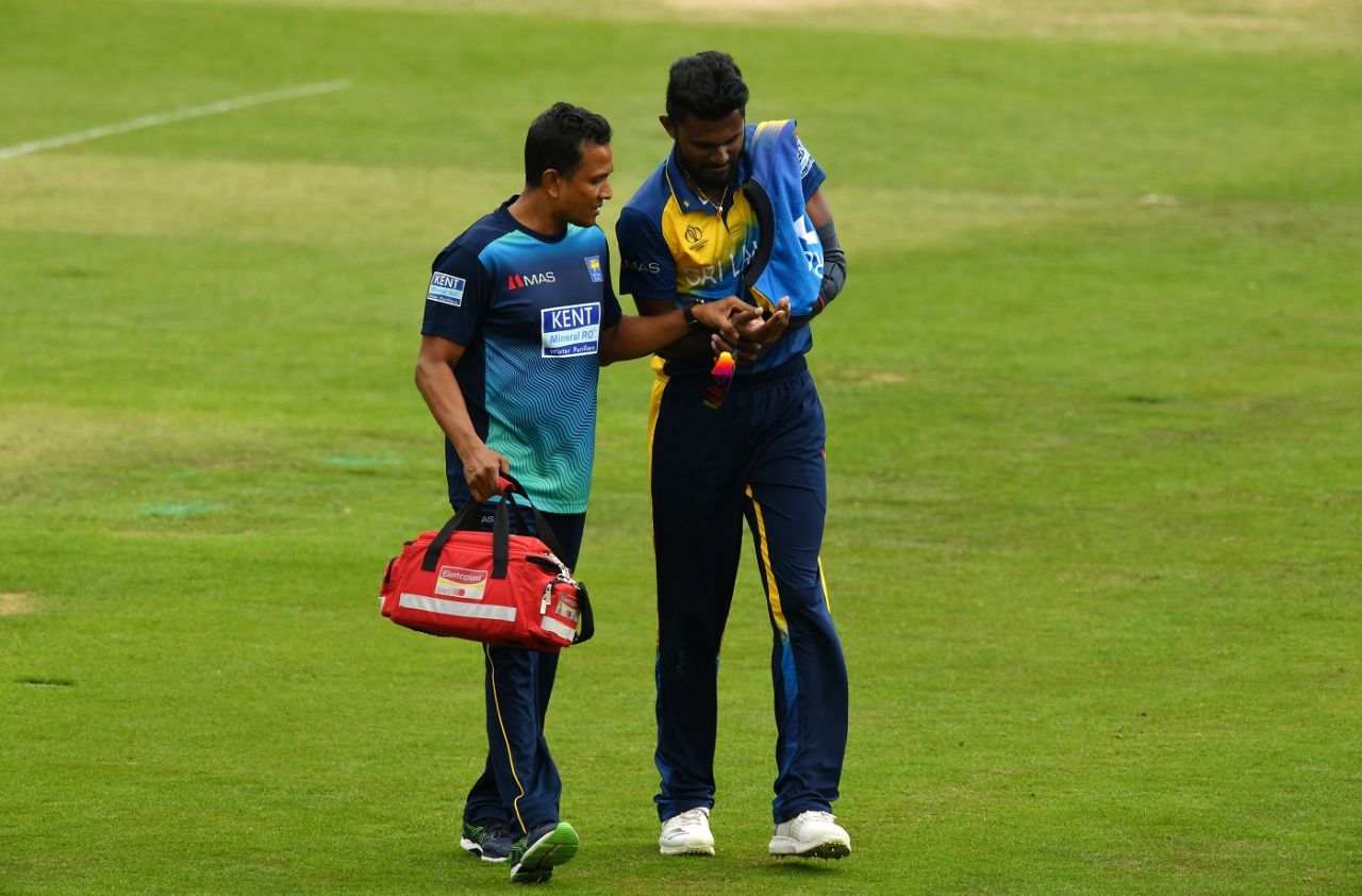 Isuru Udana leaves the field after getting hit on the right wrist, South Africa v Sri Lanka, warm-up match, World Cup 2019, Cardiff, May 24, 2019
