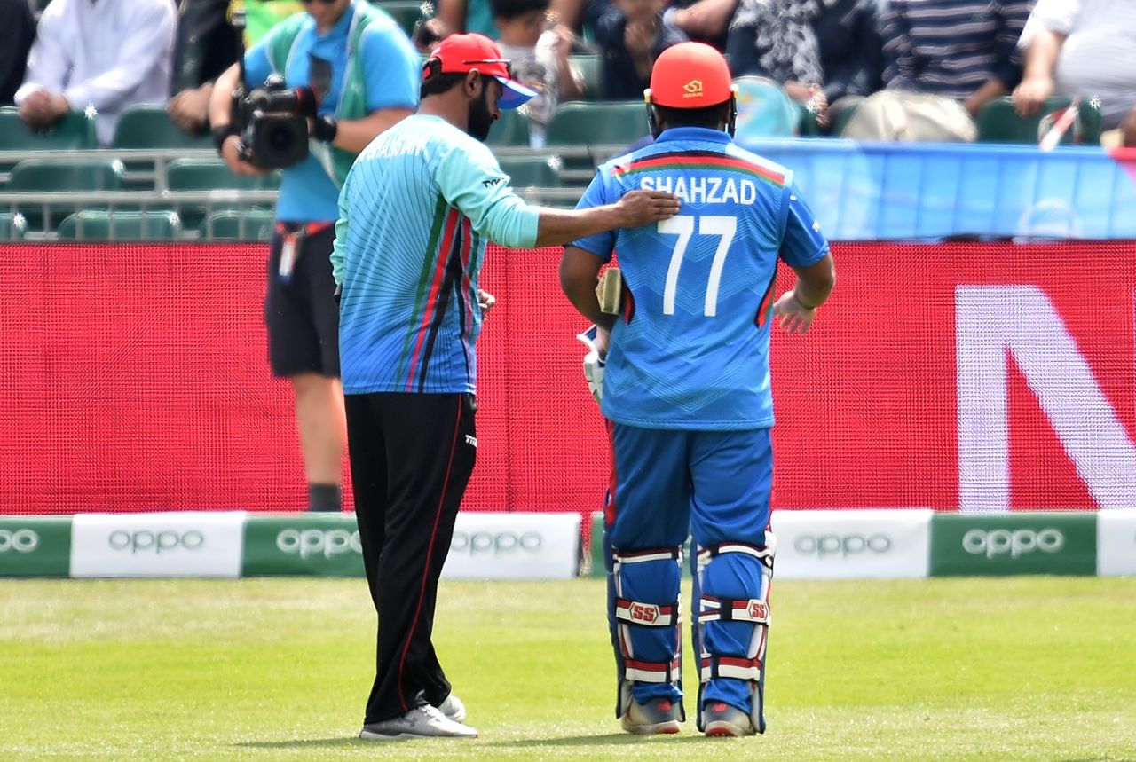 Mohammad Shahzad walks off after injuring his knee, Afghanistan v Pakistan, ICC World Cup warm-up, Bristol, May 24, 2019