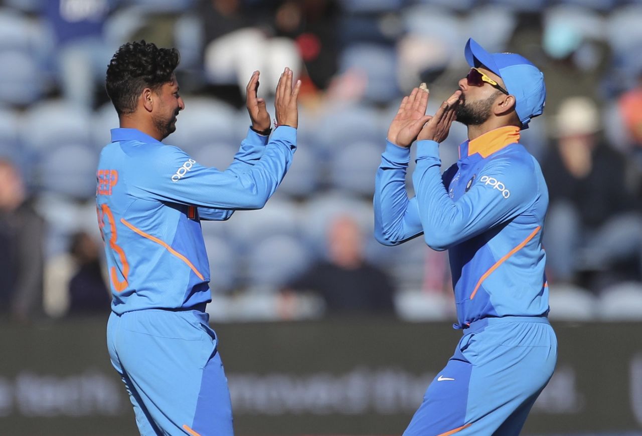 Kuldeep Yadav and Virat Kohli celebrate a wicket, Bangladesh v India, World Cup 2019 warm-up, Cardiff, May 28, 2019