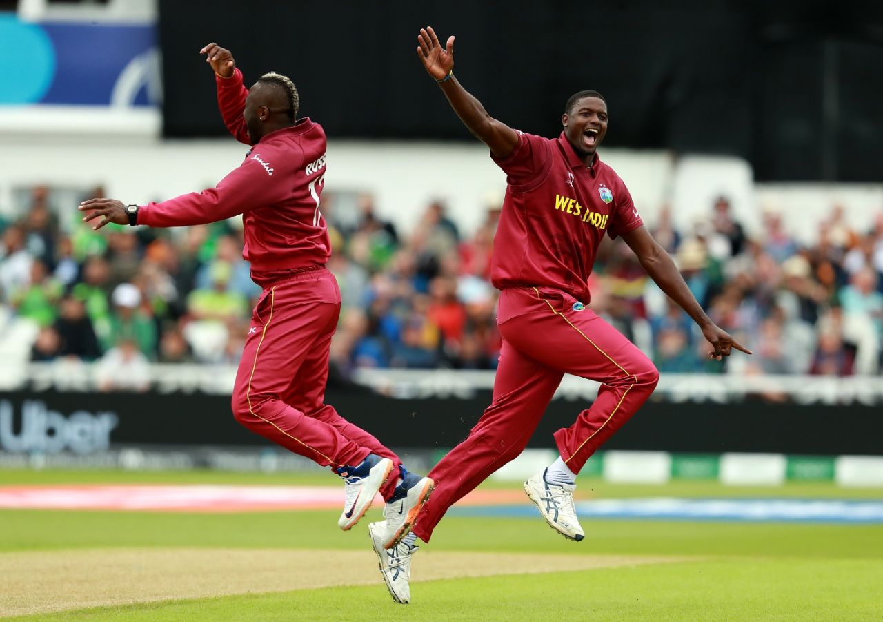 Jason Holder and Andre Russell celebrate Imad Wasim's wicket, Pakistan v West Indies, World Cup 2019, Trent Bridge, May 31, 2019