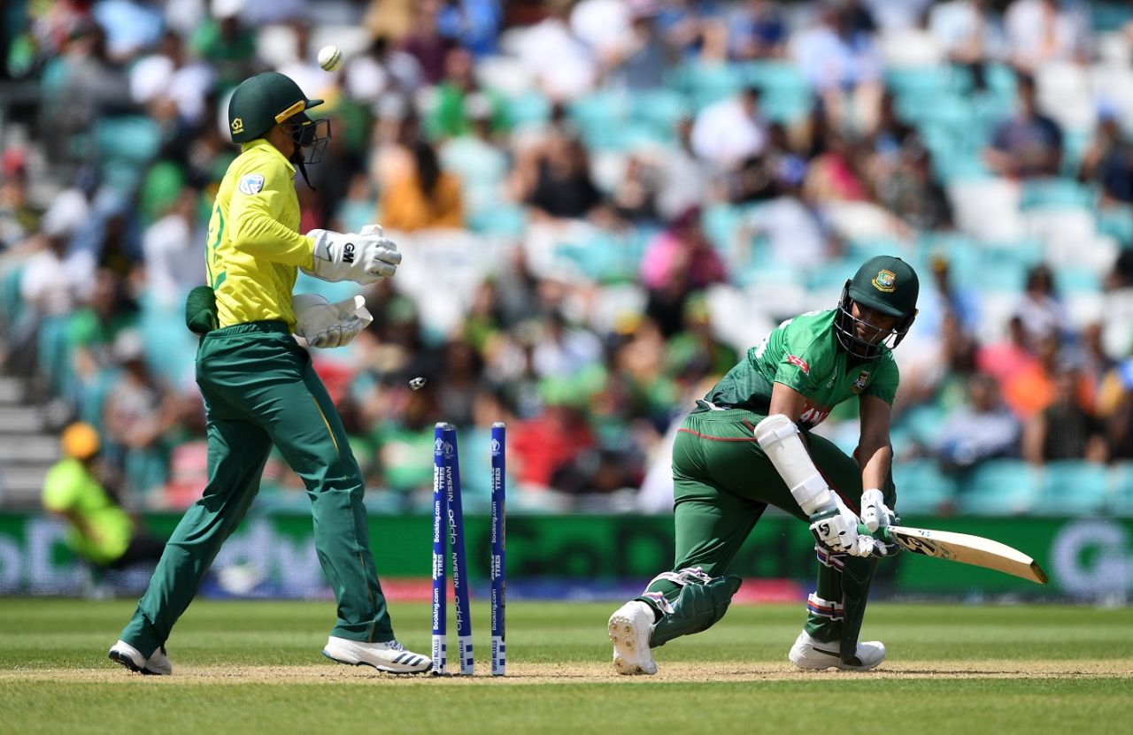 Shakib Al Hasan of Bangladesh is bowled by Imran Tahir as Quinton de Kock looks on,
Bangladesh v South Africa, World Cup 2019, The Oval, June 2, 2019