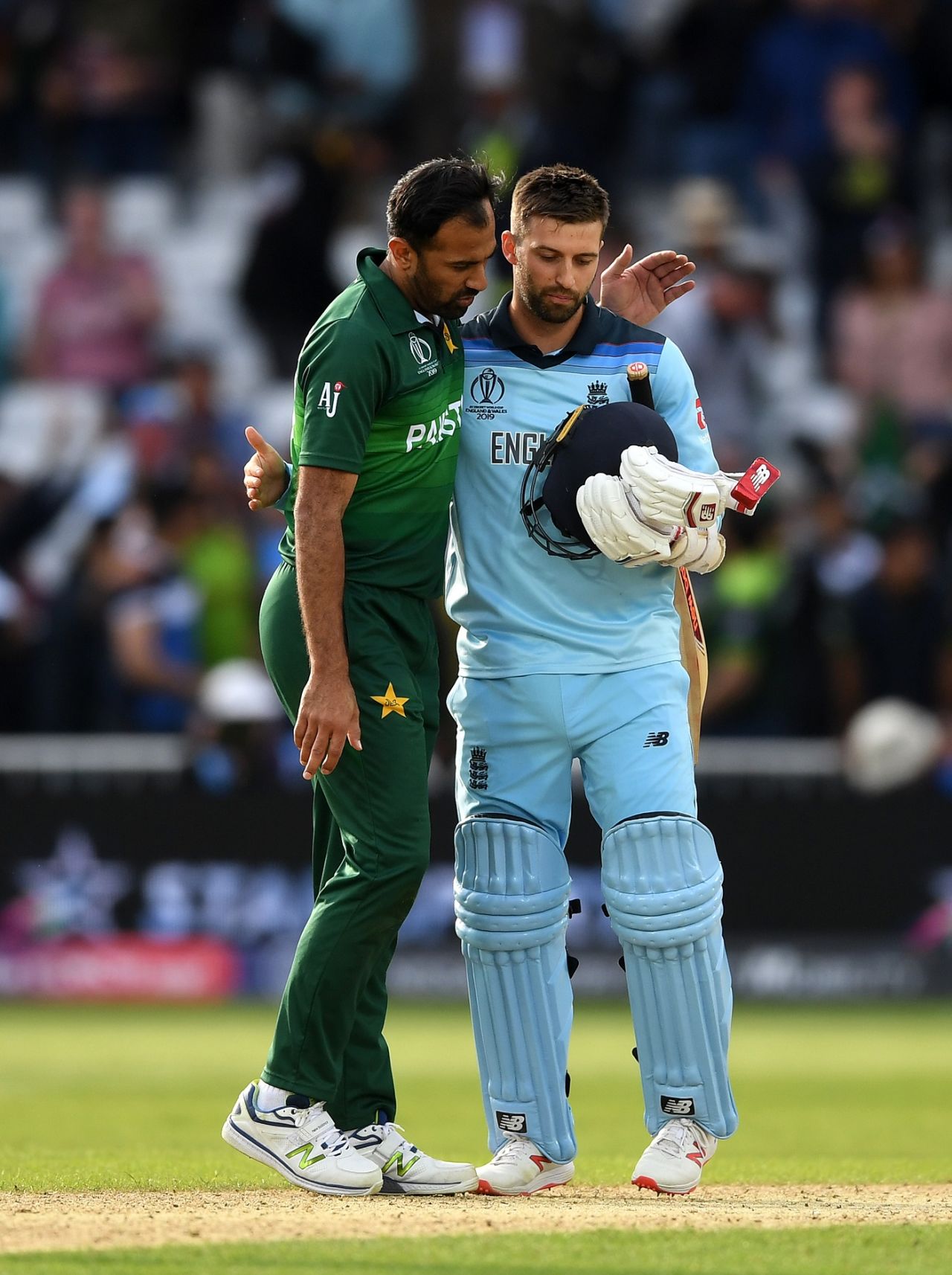 Wahab Riaz and Mark Wood pat each other after the game, England v Pakistan, World Cup 2019, Trent Bridge, June 3, 2019