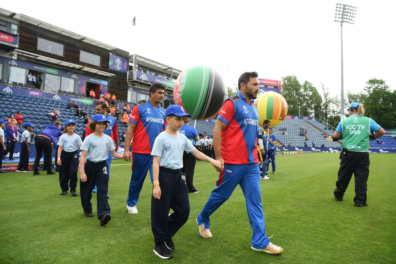 Gulbadin Naib leads his team out, Afghanistan v Sri Lanka, World Cup 2019, Cardiff, June 4, 2019