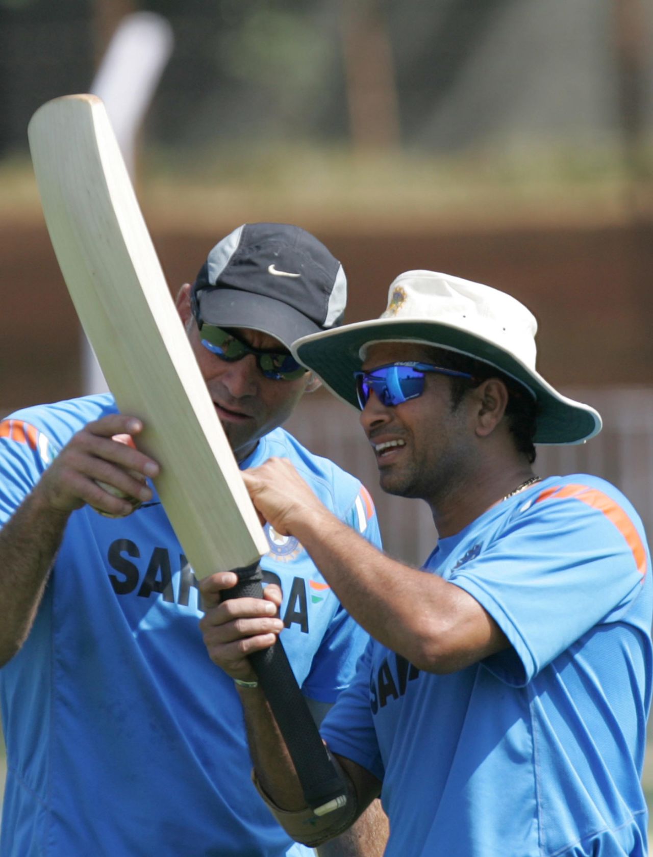 Paddy Upton and Sachin Tendulkar inspect a bat at training, the day before the match, India v Australia, 1st ODI, Vadodara, October 24, 2009