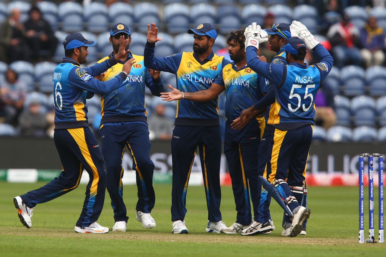 Dimuth Karunaratne sends one away watched by Mohammad Shahzad, seventh match, World Cup 2019, Afghanistan v Sri Lanka, Cardiff, Wales, June 04, 2019