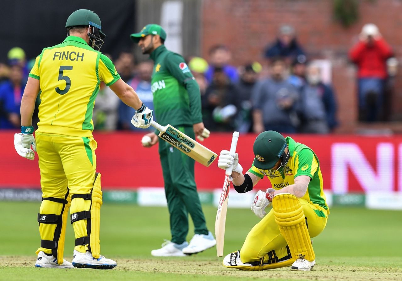 David Warner taps down the pitch as Aaron Finch looks on, Australia v Pakistan, World Cup 2019, Taunton, June 12, 2019
