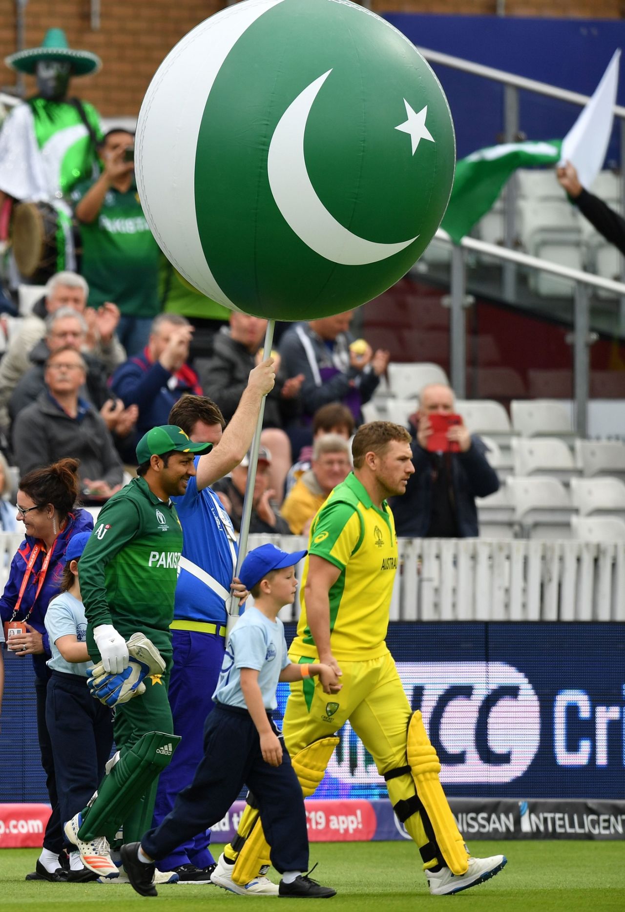 Sarfaraz Ahmed and Aaron Finch lead their teams onto the field, Australia v Pakistan, World Cup 2019, Taunton, June 12, 2019
