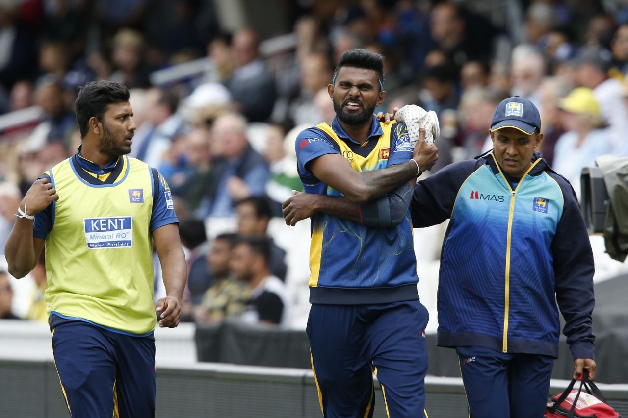 Sri Lanka's Isuru Udana walks off after getting injured while fielding, Australia v Sri Lanka, World Cup 2019, The Oval, June 15, 2019