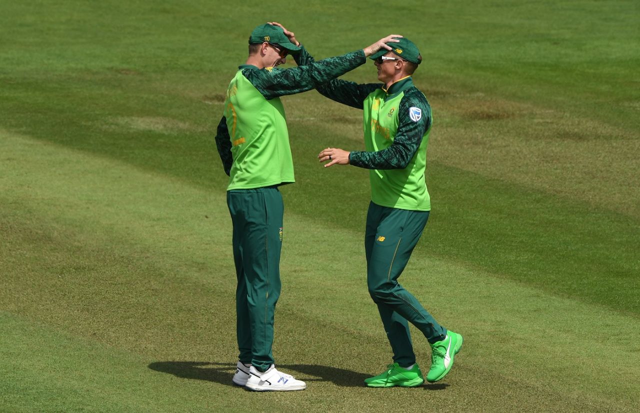 Rassie van der Dussen is congratulated by Chris Morris after his catch off Hazratullah Zazai, Afghanistan v South Africa, World Cup 2019, Cardiff, June 15, 2019