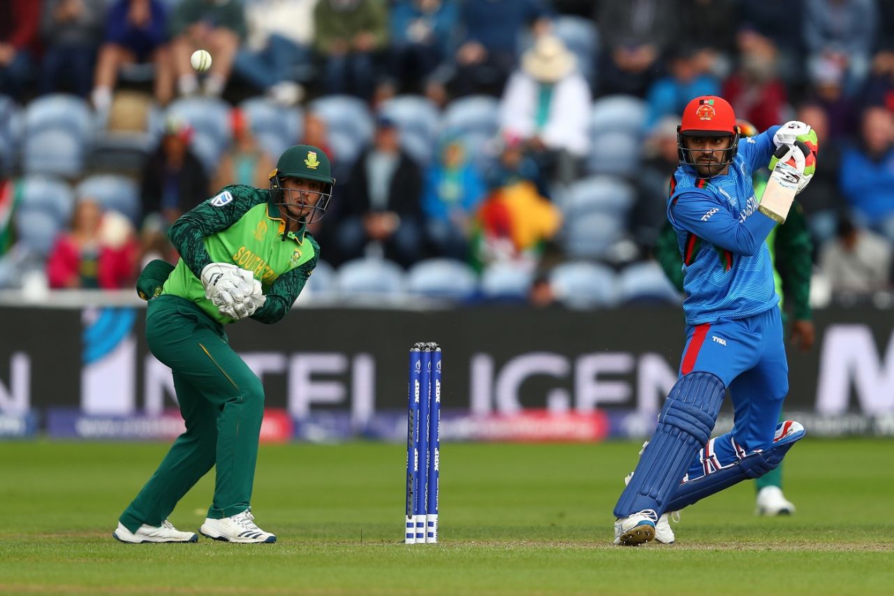 Rashid Khan plays a shot as Quinton de Kock looks on, Afghanistan v South Africa, World Cup 2019, Cardiff, June 15, 2019