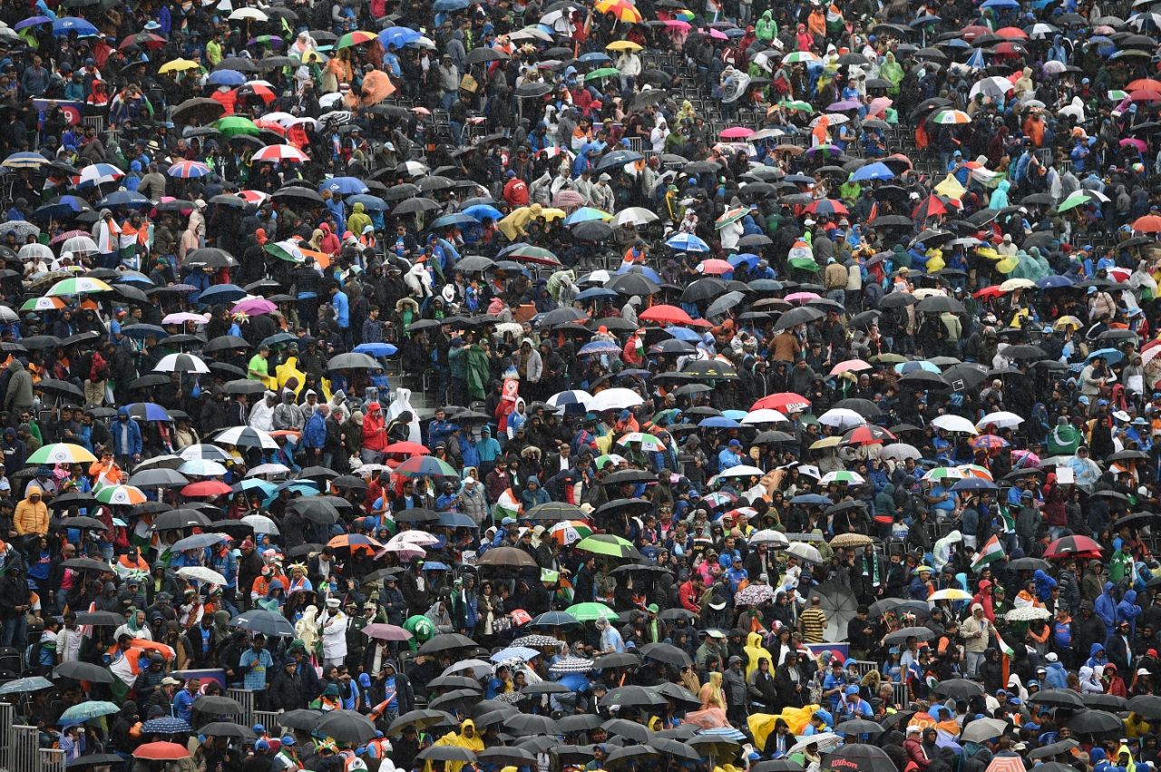Umbrellas come out as rain stops play, India v Pakistan, World Cup 2019, Old Trafford, June 16, 2019 