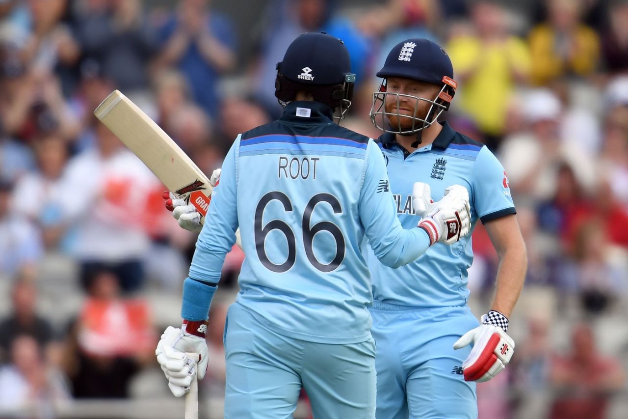 Jonny Bairstow celebrates his half-century with Joe Root, England v Afghanistan, World Cup 2019, Manchester, June 18, 2019