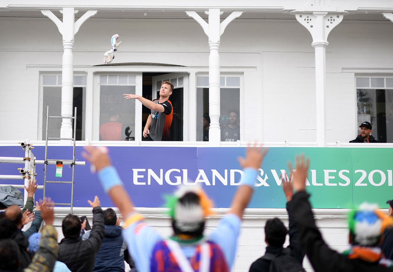 Jimmy Neesham throws a pair of gloves to the crowd, India v New Zealand, World Cup 2019, Trent Bridge, June 13, 2019