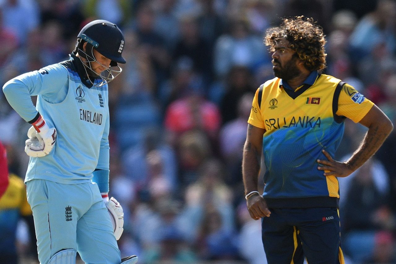 Lasith Malinga and Joe Root wait after a DRS appeal that ultimately proved succesful for Sri Lanka, England v Sri Lanka, World Cup 2019, Headingley, June 21, 2019