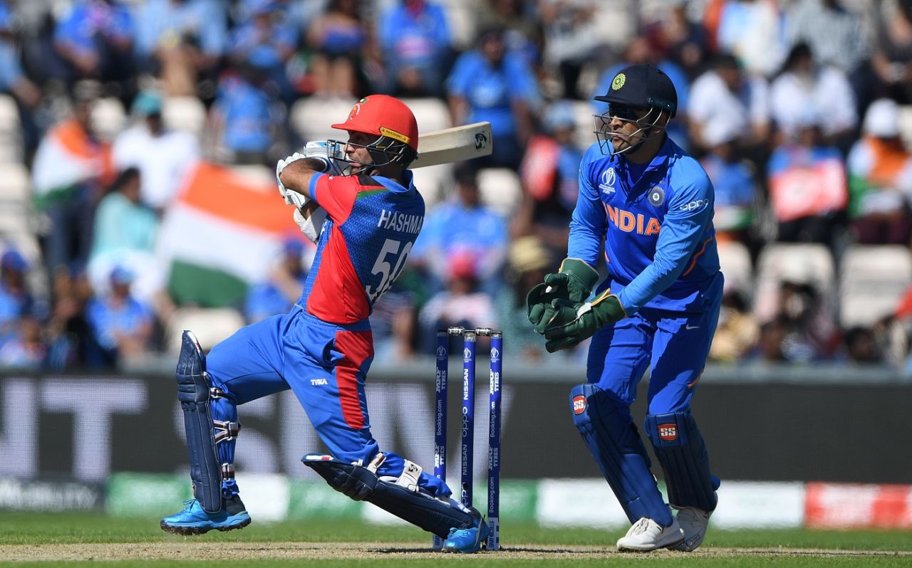 MS Dhoni looks on as Hashmatullah Shahidi smacks one to the boundary, Afghanistan v India, World Cup 2019, Southampton, June 22, 2019