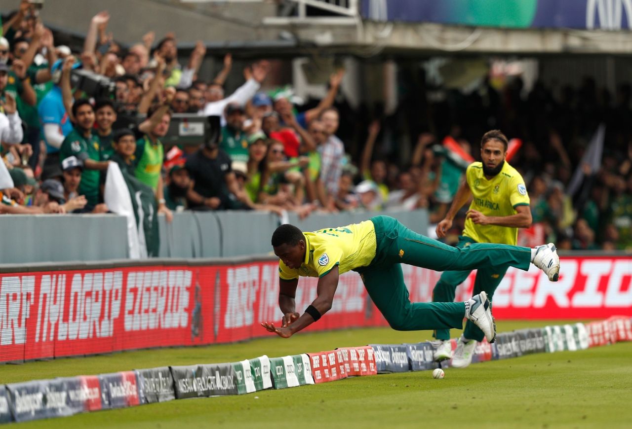 Lungi Ngidi and Imran Tahir attempt to stop a boundary, Pakistan v South Africa, World Cup 2019, Lords, June 7, 2019