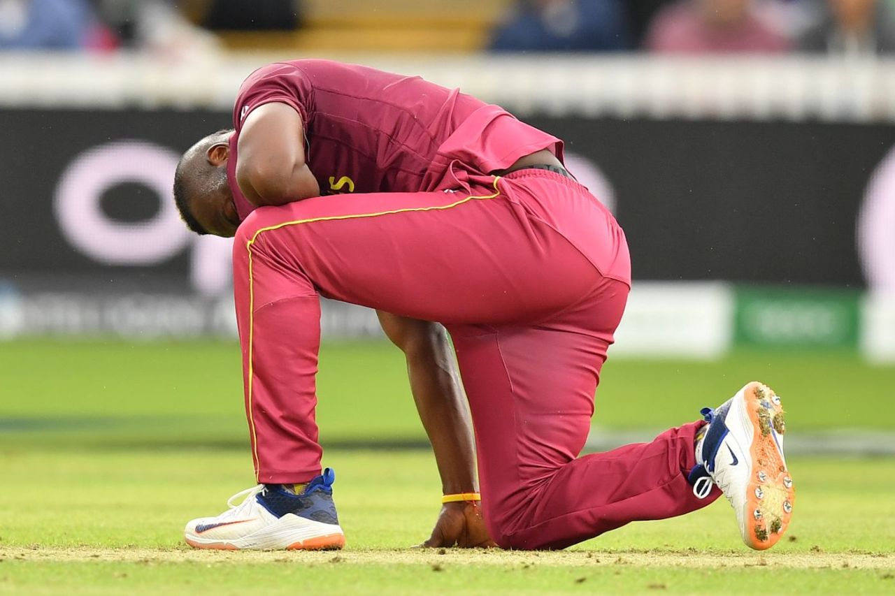 Andre Russell grimaces after slipping on the field, Bangladesh v West Indies, World Cup 2019, Taunton, June 17, 2019