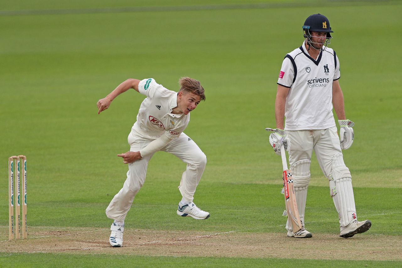 Sam Curran of Surrey bowls as Warwickshire's Dominic Sibley looks on, Surrey v Warwickshire, County Championship Division One, 3rd day, The Oval, June 25, 2019